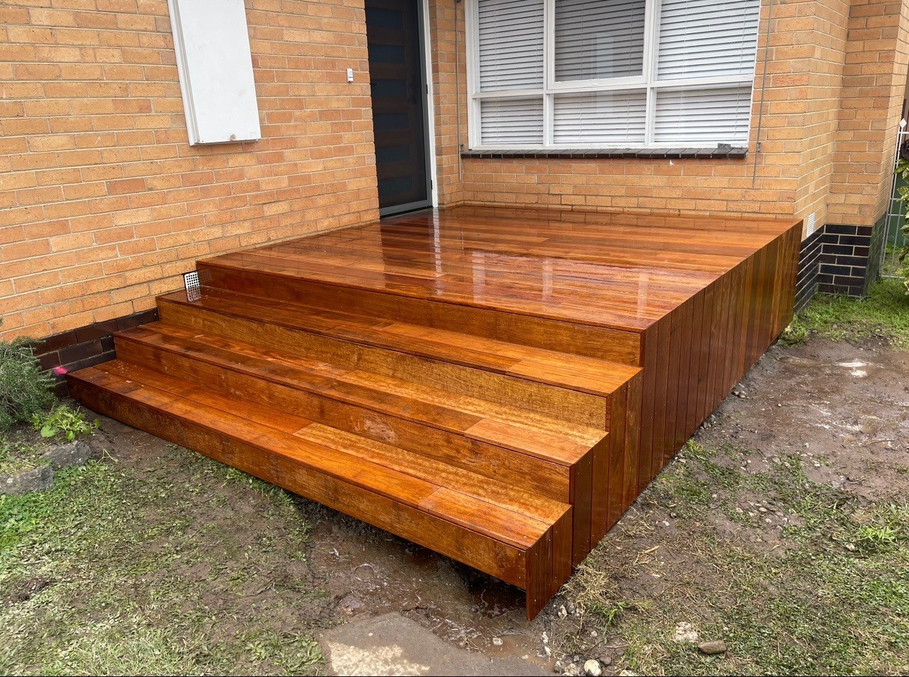 Hardwood front-door deck and steps